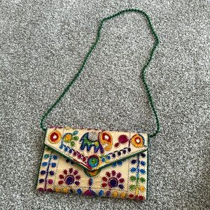 Elephant embroidered clutch